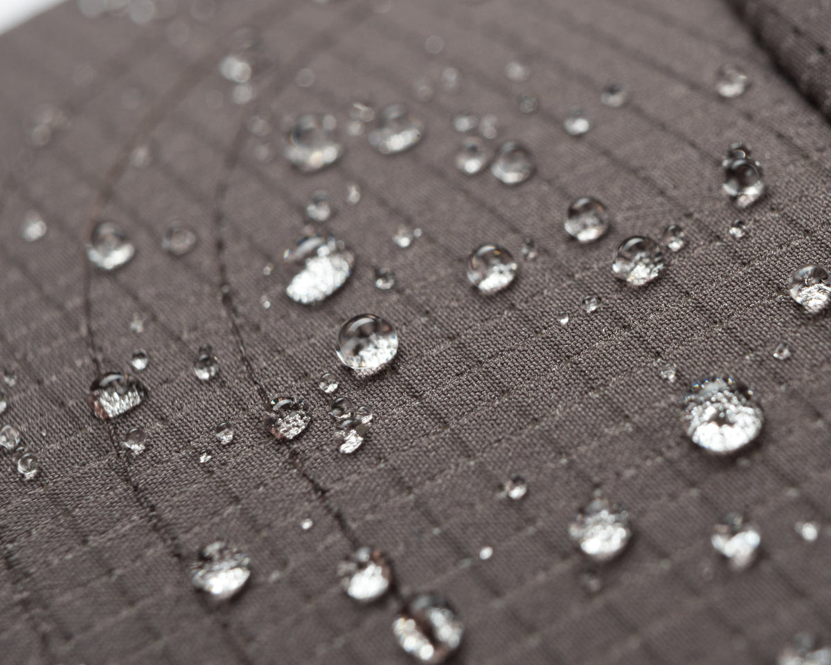 Satisfy Rippy Air Trail Cap - Rocky Road - Water repellent detail