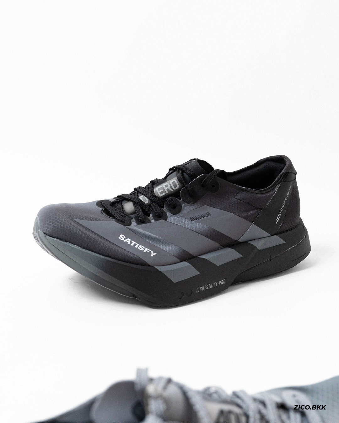 Adidas x SATISFY Adizero Adios Pro 4 Black side view - ZICO.BKK