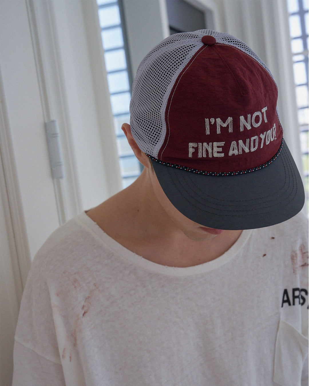 IAMNOTELITE RIPOFF RUNNING CAP BURGUNDY worn top view